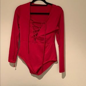 Red tie up body suit